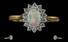 Ladies 18ct Gold Opal and Diamond Set Cluster Ring. Full Hallmark to Interior of Shank. The