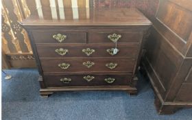 Georgian Style Small Mahogany Chest of Drawers, two short over three, raised on four stepped feet.
