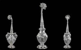 A Unique Antique Mughal Indian Silver Rosewater Sprinkler with a rose headed stem, supported by