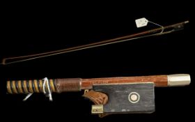 An Antique Violin Bow stamped Techler. 74 cm in length.