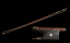 A Good Antique Silver Mounted German Violin Bow, stamped Adolf C Schuster. 74 cm in length.