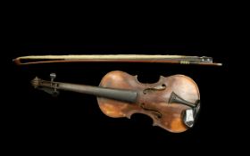 An Antique Violin, with a dark umber finish, Strad type, unlabelled. In a fitted case with a bow. As