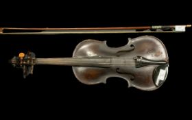 A Good Antique Violin of Dark Colour, traces of a label to the interior. It appears to be a single