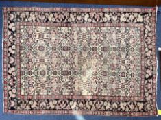 Persian Style Rug, decorative pattern of reds and blues, early 20th Century. Measures 78
