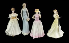 Three Royal Doulton Figurines, to include HN3609 'Kathleen', HN4040 'Kathryn' and HN4215 'Happy