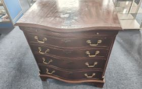 Mahogany Serpentine Fronted Chest of Drawers, with four graduating drawers with brush slide. Early