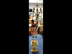 Large Modern Resin Blackamoor Figure, holding a seven branch candelabra aloft. Height approx. 80''.