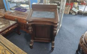 A Reproduction Mahogany Ladies Davenport, fitted witha blue leather insert to the lid and a bank
