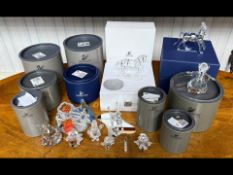 Collection of Eleven Boxed Swarovski Items, to include Angel, Santa, two Snowmen, Little Snowman,