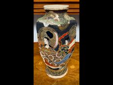 Japanese Satsuma Vase, early 20th century, 15.5'' high, decorated with figures and floral and