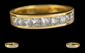 Ladies 14ct Gold Diamond Set Channel Ring, marked 14ct to shank. Well matched princess cut