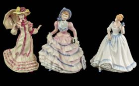Three Royal Doulton Figurines, comprising Hannah No. HN3369, Springtime HN3477, and Paula HN3234.