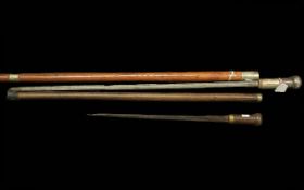 Two Antique Can Sword Sticks, with metal mounted pommels with bandings probably military. 38'' x
