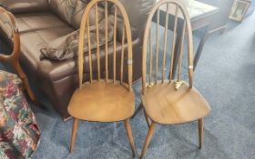 Two Ercol Quaker Windsor Elm & Beechwood Dining Chairs, spindle back, splayed legs.