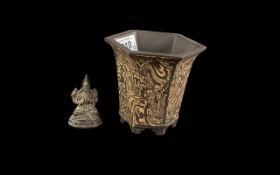 Two Pieces of Collectibles, to include a Chinese Yixing bonsai pot, and a small Tibetan bronze