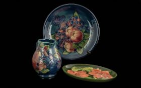 Three Pieces of Moorcroft, comprising 'Blue Finches' plate 10'' diameter, 'Blue Finches' matching