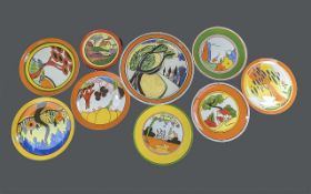 Collection of Clarice Cliff Pottery & Associated, to include 'Bizarre' plates styles Windbells,
