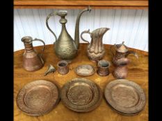 Collection of Brass & Copper Ware, to include a set of eight 7.5'' plates, a Dallah coffee pot,
