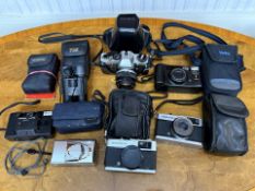 Box of Vintage Cameras, to include five Olympus cameras, a Vivitar, and a pair of Bausch & Lamb