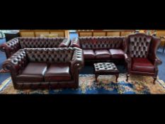 Chesterfield Suite in Oxblood Leather, comprising two x three seater sofas, a two seater sofa, a