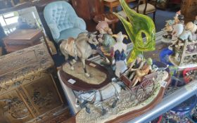Collection of Figures, to include Nico horse mounted on a plinth, horse and cart on plinth, Marco