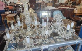 Two Crystal Chandeliers with five branches, chrome mounted.