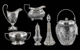 Collection of Silver Items, comprising a twin handled sugar bowl, a Georgian Style Helmet Cream Jug,