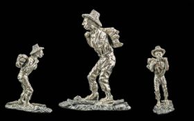 Silver Filled Figure of a Wood Gatherer,