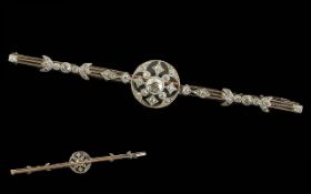 An Edwardian Platinum Bar Brooch, centra