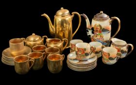 Two Part Coffee Sets, comprising a gold coloured coffee set for six, comprising coffee pot, six cups