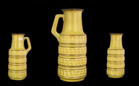 A Large 1960's West German Art Pottery Vase, in an olive green glaze with banding. Design No. 429-