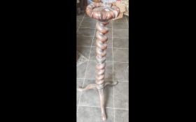 Victorian Carved Mahogany Barley Twisted Column Stand, terminating on three cabriole shaped legs.