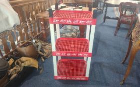 Three Tier Plastic Coca Cola Shelving Unit for Bottles. Height 38.5'' x 19'' x 16''.