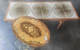 A Good G Plan Teak Coffee Table, with a 12 tile abstract designed top. Length 50'', height 16'',
