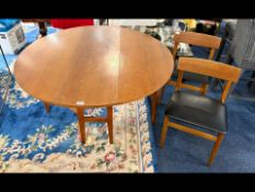 Mid Century Drop Leaf Kitchen Table & Two Chairs. Chairs with leatherette cushion seats. Table