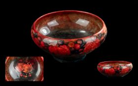 Moorcroft Flambe Bowl, with berries and leaf design, signature mark. Professionally restored. 8''