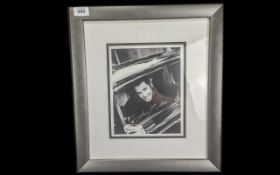 A John Travolta Signed Picture with a signed letter directly from the John Travolta Fan Club.