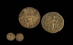 Two Interesting Old Coins, one appears to be Roman or Greek, with a hammered coin depicting a