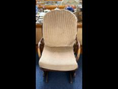 Canadian Mahogany Rocking Chair, with spindle back, upholstered back and seat, sprung seat.