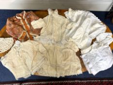 Mixed Lot of Fabrics, including a Christening gown, tablecloths, small child's Japanese jacket, etc.