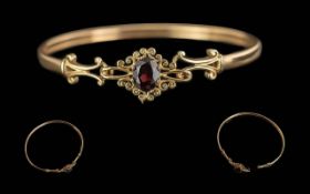 Ladies - Pleasing 9ct Gold Solid Bangle Set with Central Garnet of Good Colour, Full Hallmark to