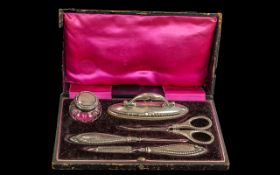 Boxed Silver Manicure Set, in fitted velvet and silk lined box, complete.
