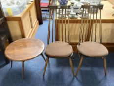 Ercol Drop Leaf Coffee Table, together with two Ercol Goldsmith Windsor spindle back dining