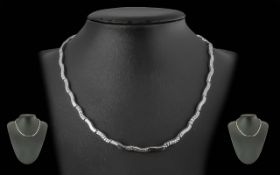 Ladies - Pleasing 9ct White Gold Necklace with Lobster Claw Clasp. Marked 9.375. Weight 9.1 grams.
