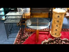Three Pieces of Furniture, to include a teak framed glass topped coffee table, a circular chest of