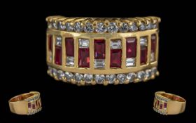 Ladies Modern and Impressive 18ct Gold Multi Chanel Set Ruby and Diamond Ring. Marked 750 - 18ct