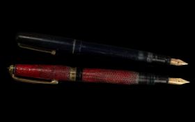 ( 2 ) Fountain Pens. Comprises 1 / Swan with 14k Gold Nib. 2/ Wyvern 101 with 14k Gold Nib.