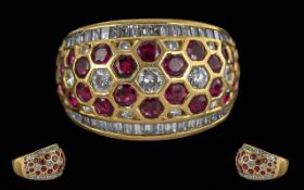 Ladies Modern 18ct Gold Ruby and Diamond Set Multi Chanel Band Ring. Marked 18ct to Interior of