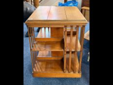 Edwardian Golden Oak Bookcase of square form, raised on castors. Height 30'' x 23'' square.