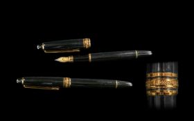 **WITHDRAWN** Montblanc Fountain Pen with black case with gold tone decoration. Marked Montblanc